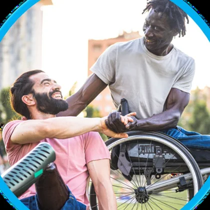 Two friends out together, one of them a wheelchair user.